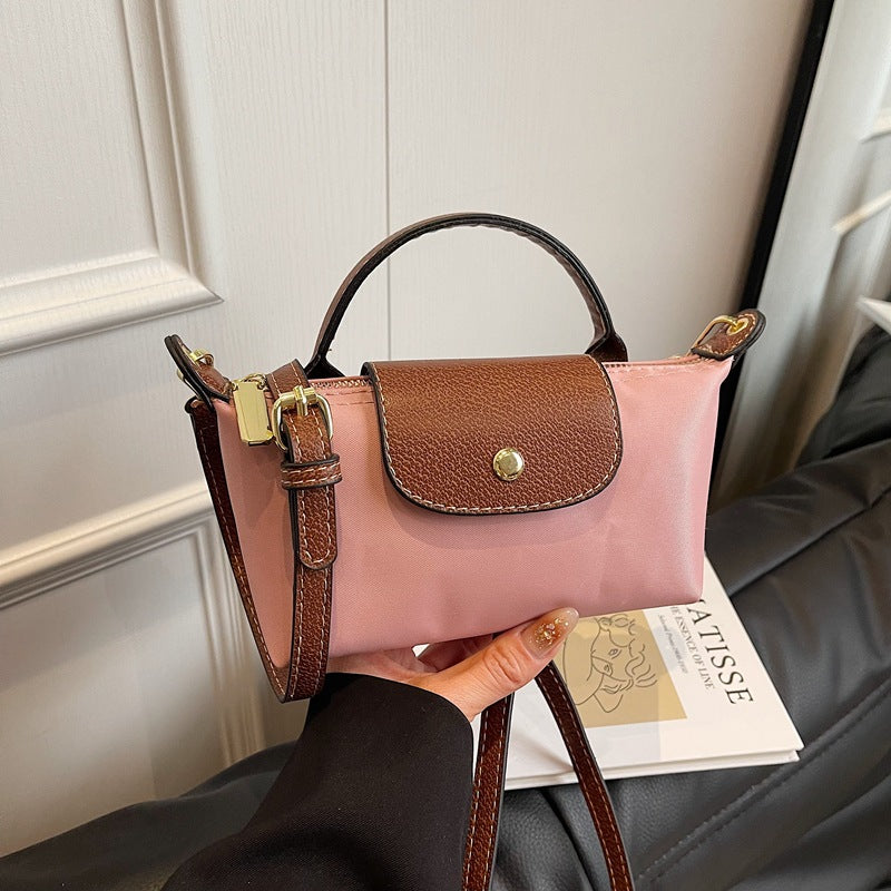 2025 Women's Mini Dumpling Handbag. Made of high - end nylon. Stylish shoulder/crossbody phone bag.