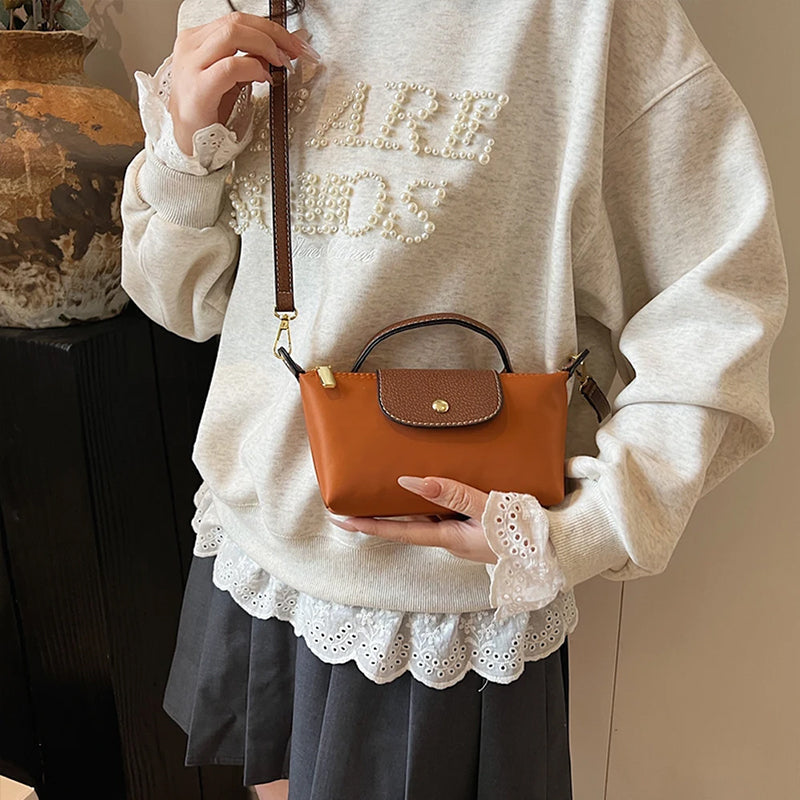 2025 Women's Mini Dumpling Handbag. Made of high - end nylon. Stylish shoulder/crossbody phone bag.